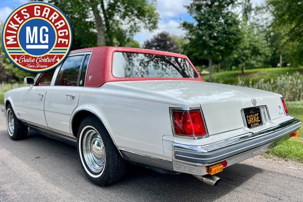 CADILLAC SEVILLE 5,7L ★ MYCKET FIN BIL MED LÄPPSTIFTSRÖD SKINN-INREDNING!